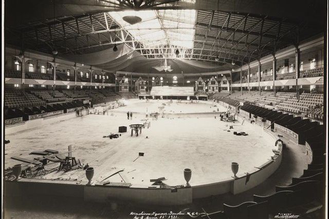 "Interior of Madison Square Garden, taking down the stage. June 11, 1921."